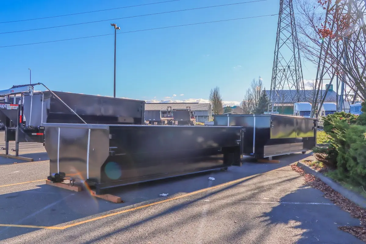 Roll-off dumpster ready for waste disposal at job site for Construction Dumpster Rental in Eau Claire